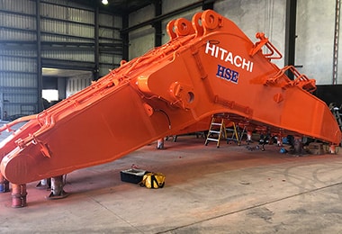 Heavy-Duty Excavator with A Newly Painted Digging Arm — Fabrication & Engineering in Mackay, QLD